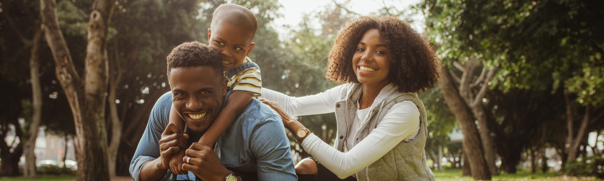 Smiling family in a park 